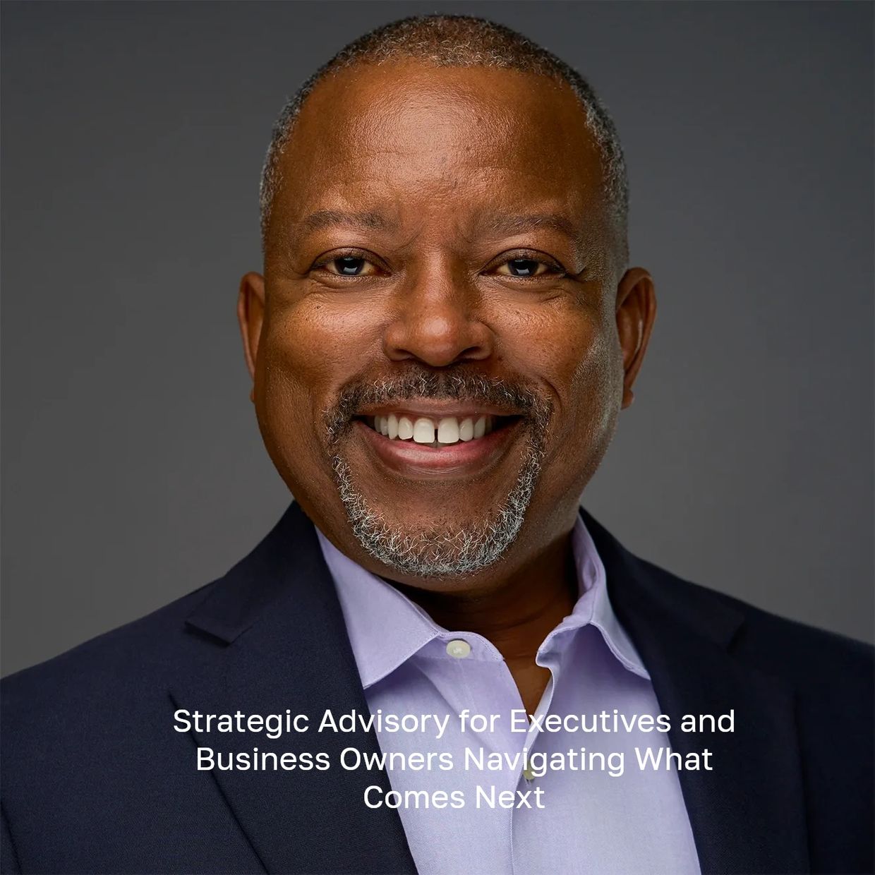 Smiling professional man in a suit with advisory message overlay.