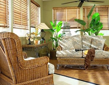 A living room with wooden blinds