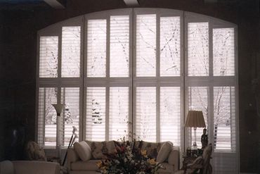 Large white window shutters