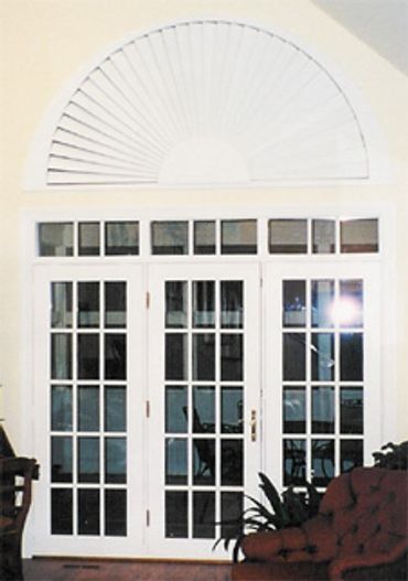 White shades for an arched window