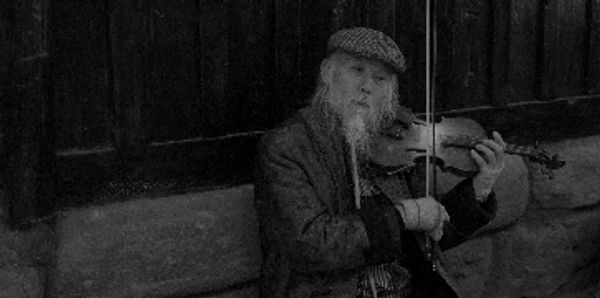 Retiree playing violin