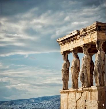 Ancient Greek Caryatids against sky and cityscape.
