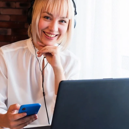 woman smiling with headphones on 