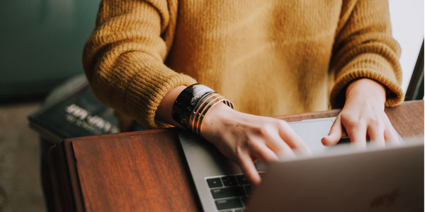 Person typing on a laptop