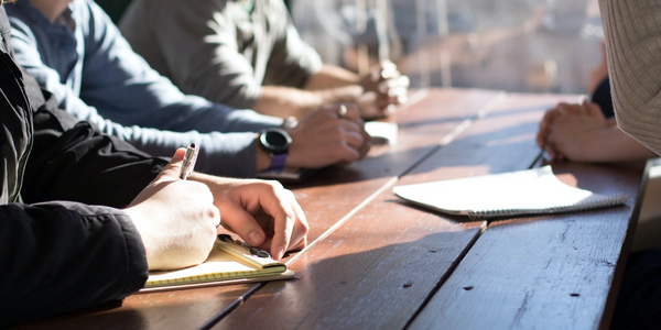 Colleagues in a letter-writing workshop