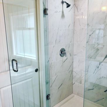 Custom tile installation of a custom shower install