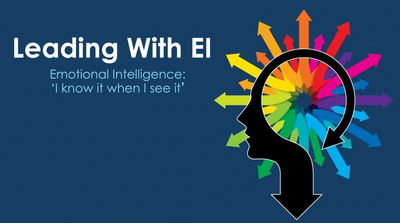 Dark blue logo image saying: Leading with EI