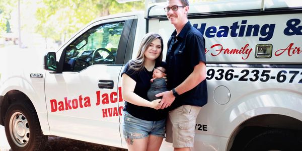 Our technician and his family in front of clean service vehicle 