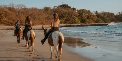 Horseback riding tour on the beach in Nosara, Costa Rica