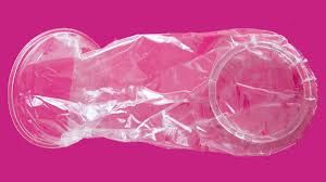 Internal condom with hot pink background