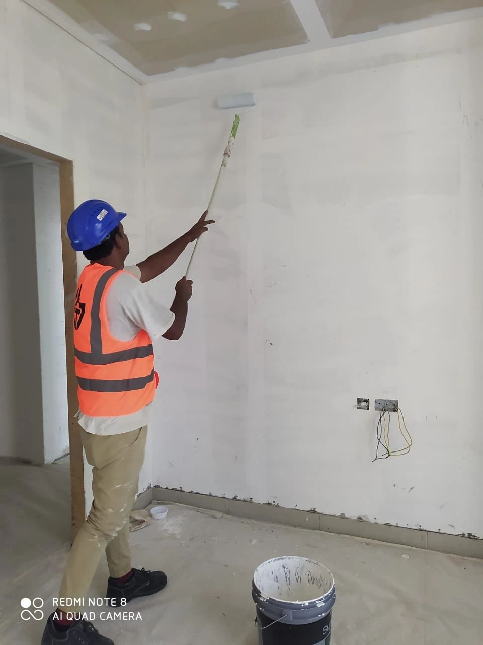 Applying Primer on the wall