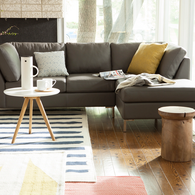 Round Solid Teak Stool and White accent side table in Living room