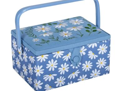 Blue sewing basket with white daisy patterns and a handle.