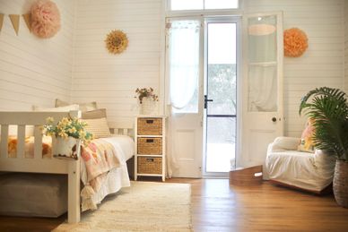 Queenslander home-based cat hotel with French doors and timber floors  