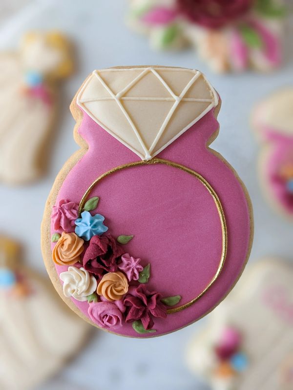 Sugar cookie shaped like a ring with florals