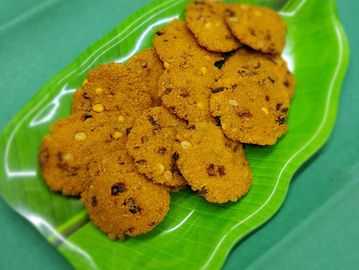 Kadalai Parappu Vadai on a green leave shaped plate.