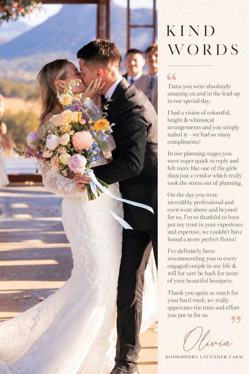 Newlyweds kiss while holding a colorful bouquet at a wedding.