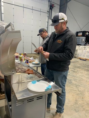 Jory & Todd grilling lunch on a rainy day!