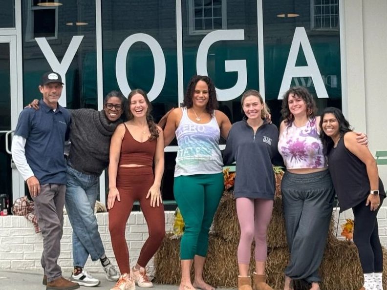 Our Franklinton Yoga Teachers in front of the studio