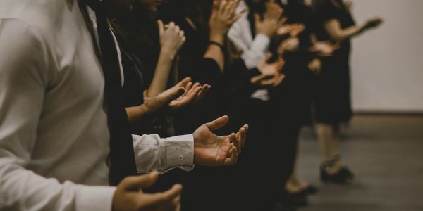 People inside the room are praying to god