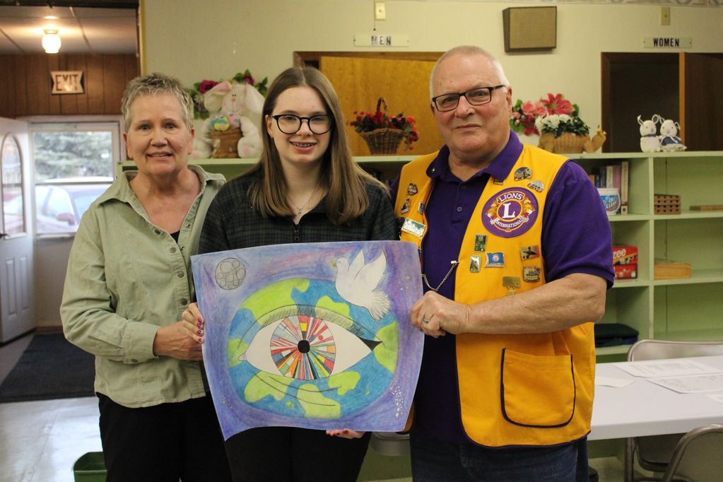 Claire Hofer Peace Poster winner 5 years ago got her poster back after winning the local club, distr