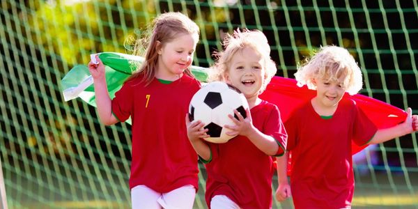 Girls playing football