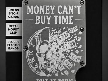A metal money clip with a skull and clock design stating money can't buy time.