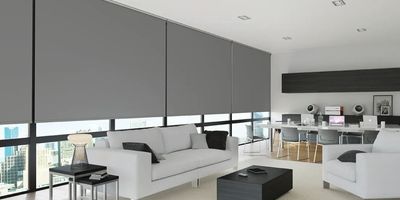 electric roller blinds in a living area in a blackout fabric