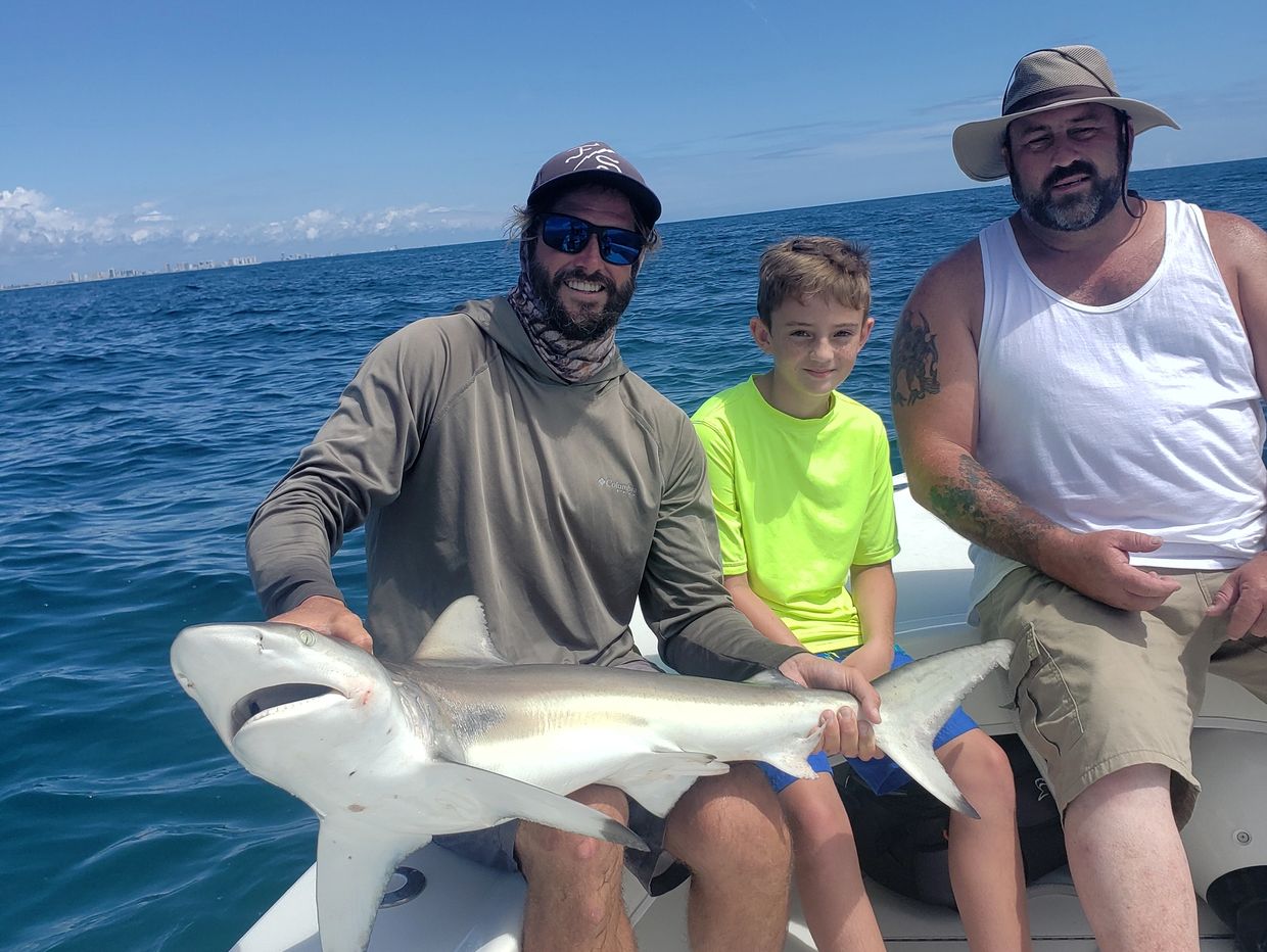 Shark fishing with clients off New Smyrna Beach Florida