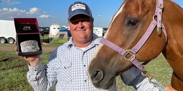 Ricky Lee from Window Wranglers in Prescott with his Team Roping Horse named Clue.
