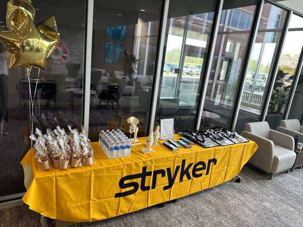 vendor booth set-up and decorations including grab-n-go snacks, and printed materials