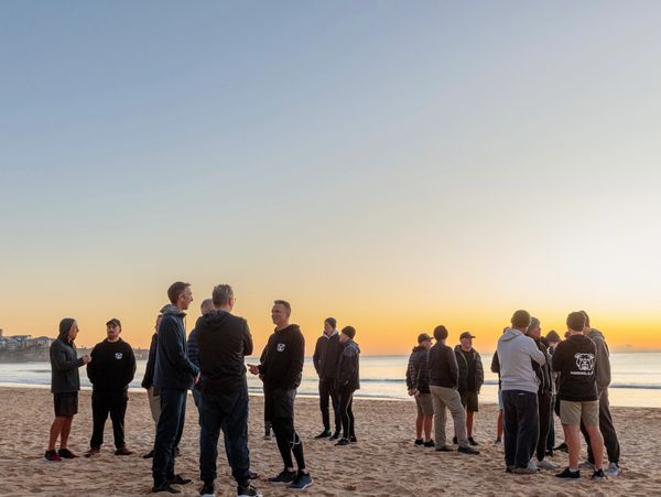 Men, conversation, community, connection, support, beach, talking