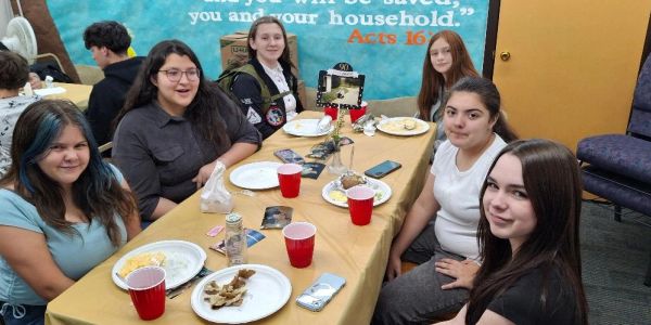 Young women enjoying fellowship.