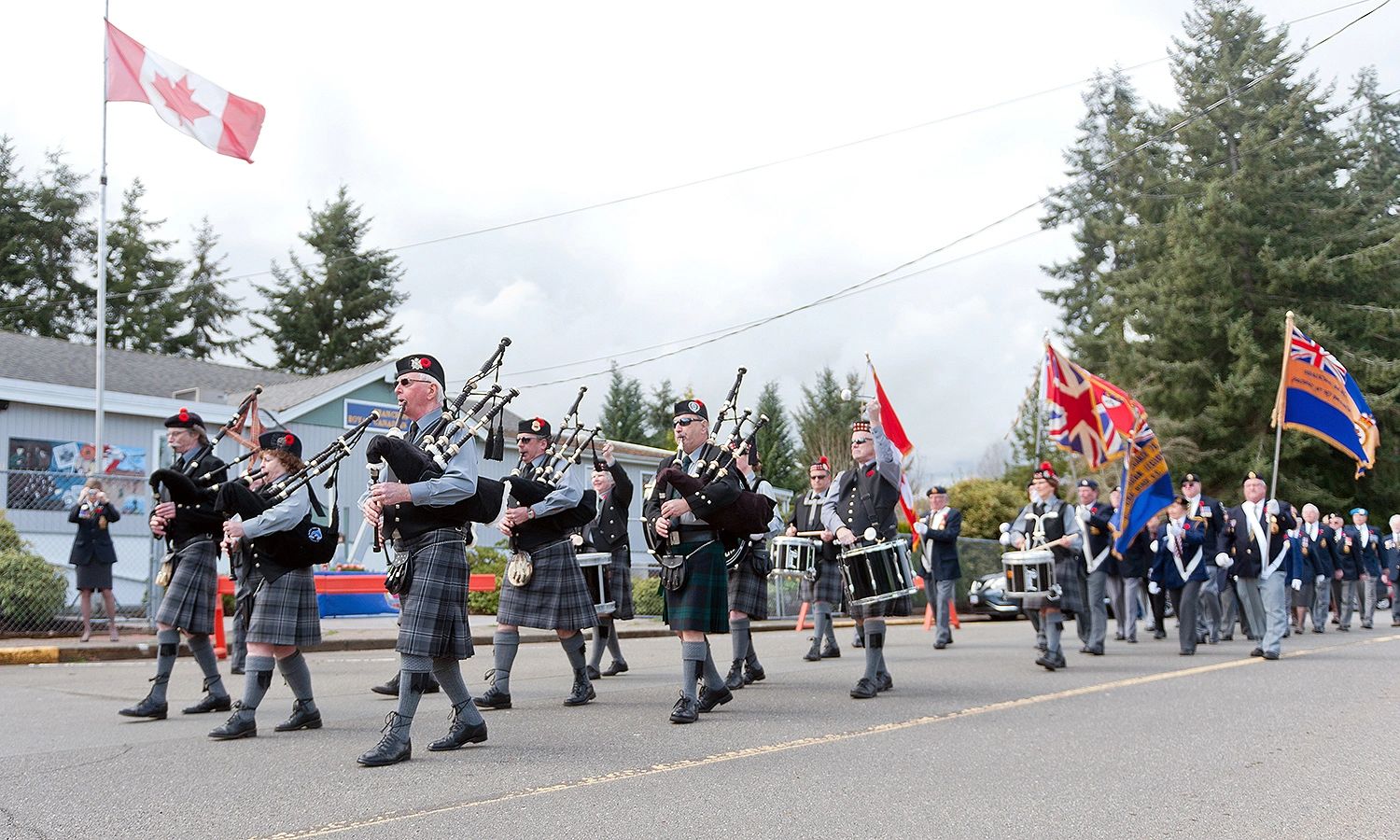 The Qualicum Beach Pipe Band leads the parade marking the 100th anniversary of the Battle of Vimy Ri