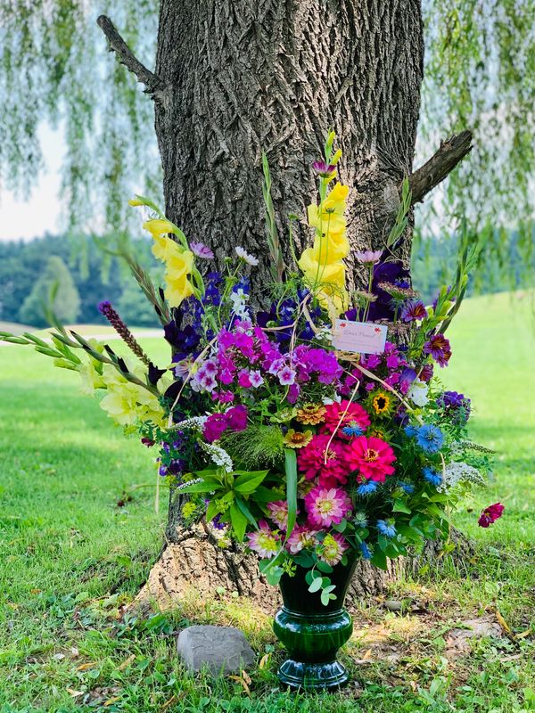 Sympathy arrangements are one of a kind and include special elements honoring your loved one. 