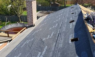 Ice and water shield and full synthetic underlayment installed on entire roof deck.