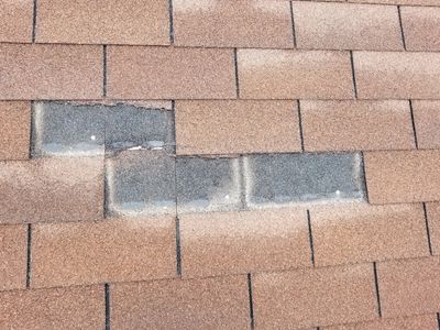 Missing shingles on a roof