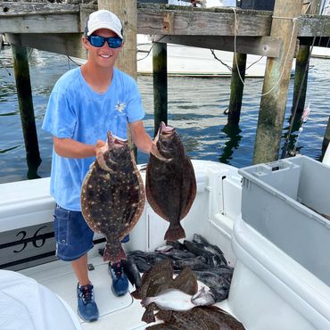 Fluke fishing
Inshore fishing charters rhode island