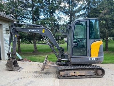 We can provide trenches for electrical, plumbing, and drain tile by using our CAT Excavator.