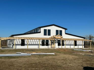 New building under clear blue sky construction site.