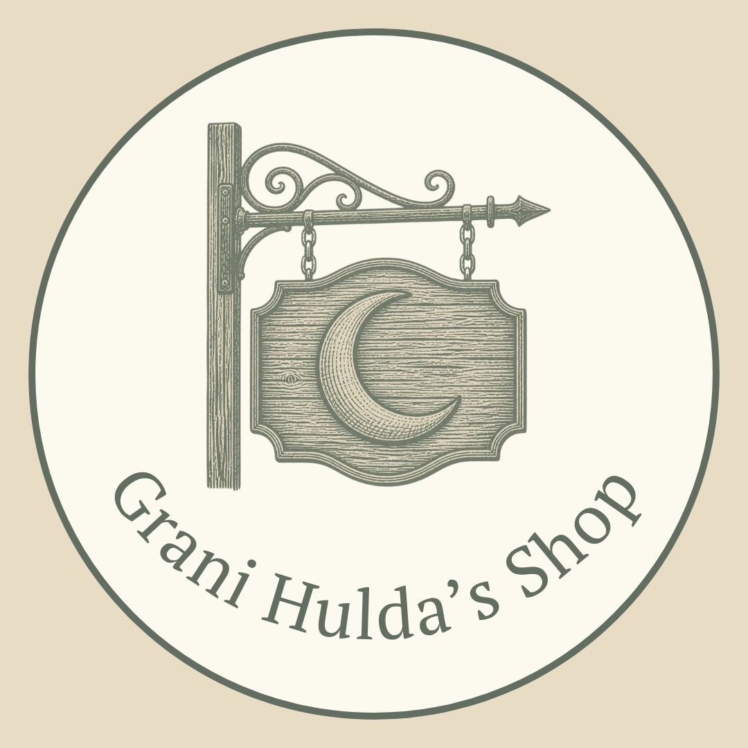 Vintage wooden shop sign with crescent moon.