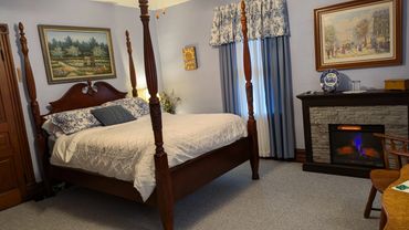Room #3 - Queen bed with electric fireplace and private bathroom