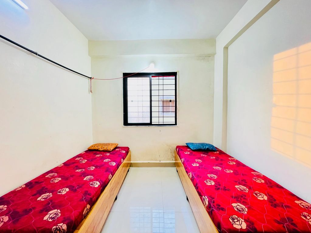 Explore photos of rooms, café & lifestyle at KP Shevkari PG & Hostel.