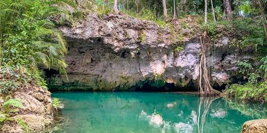 Cenote in the jungle near Puerto Morelos, Mexico