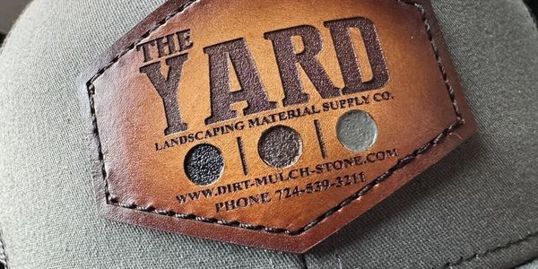 The Yard offers a wide selection of all your landscaping needs - plus hats!