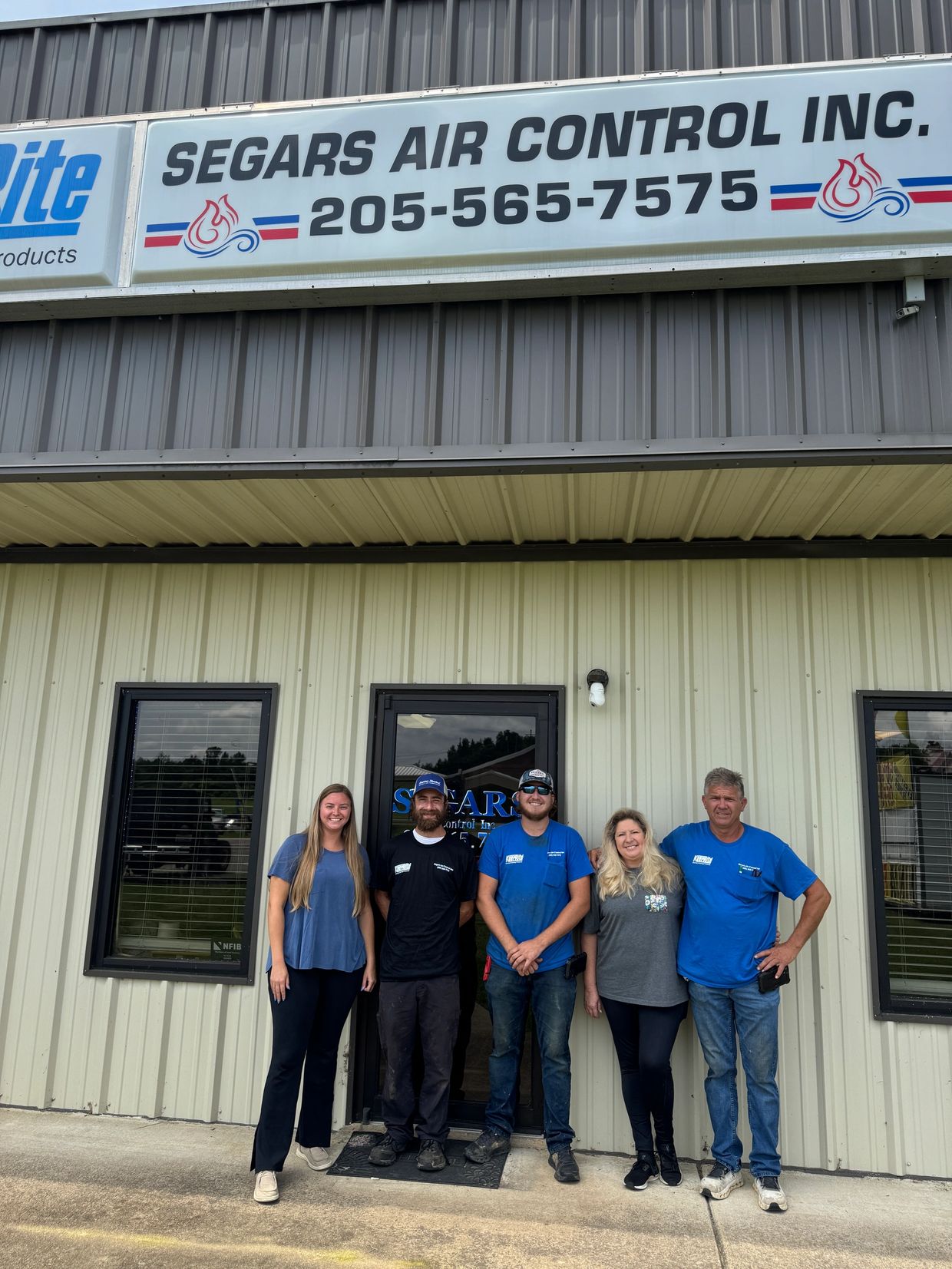 Five people standing in front of Segars Air Control Inc.