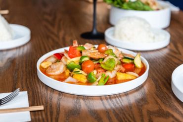 A delicious vegetable dish placed in a plate on a table