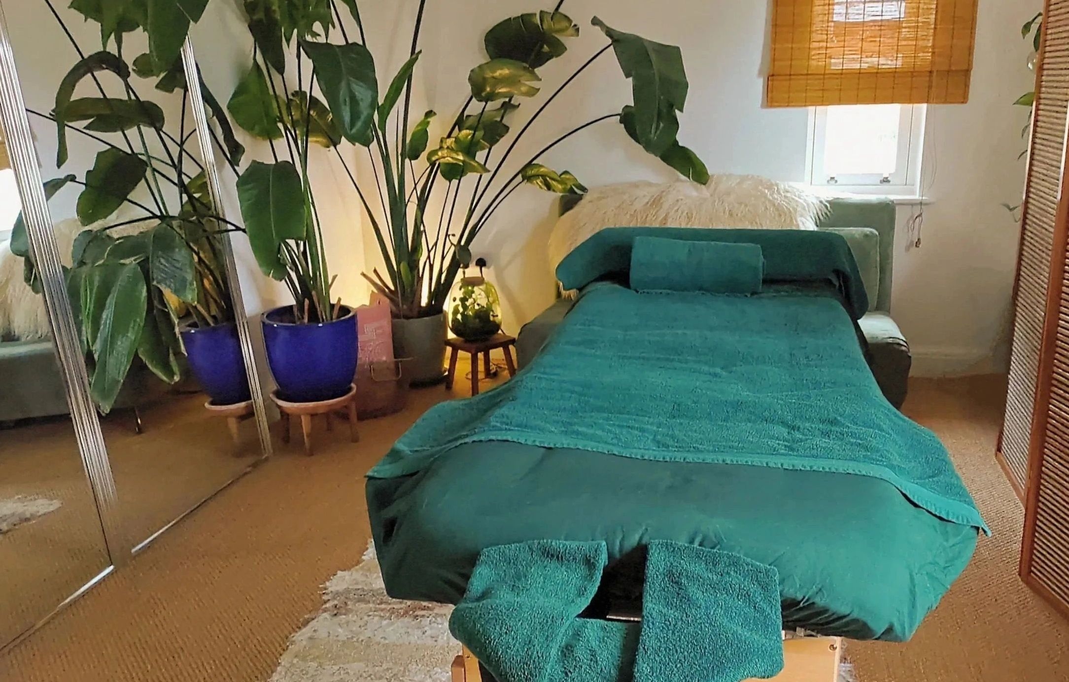 Calm massage space decorated with plants
