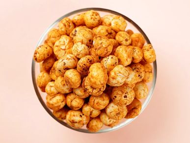 A bowl filled with seasoned roasted tiger nuts.