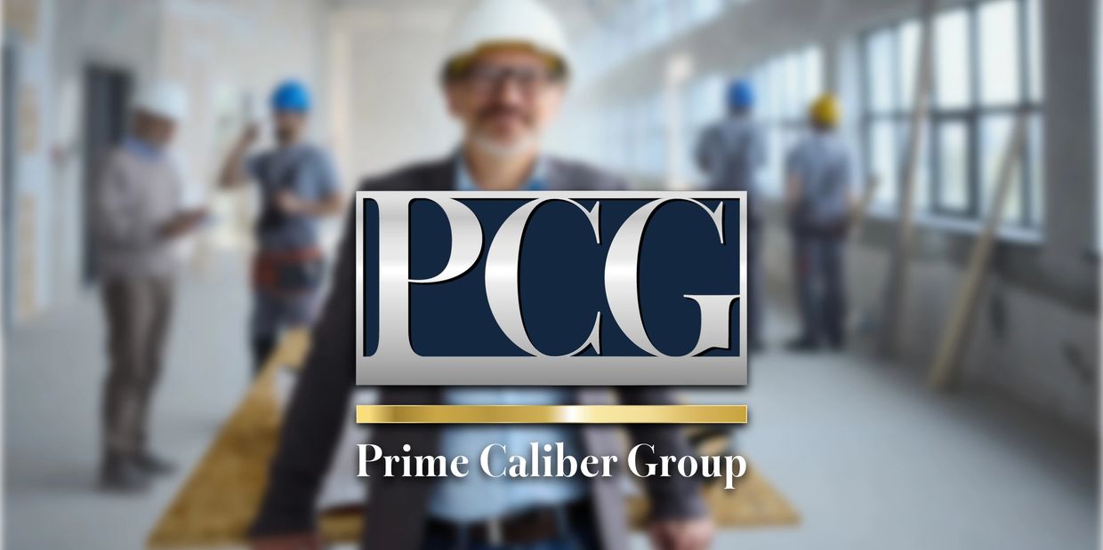 Prime Caliber Group logo overlaying a construction site with workers in helmets.